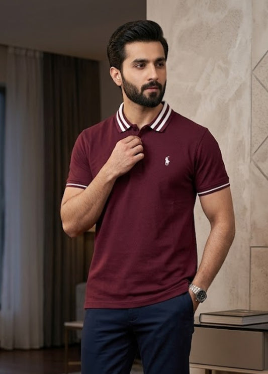 Maroon polo shirt front view with striped collar and short sleeves