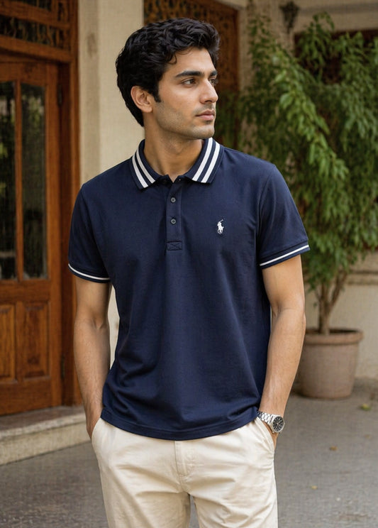 Navy blue polo shirt front view with striped collar and short sleeves
