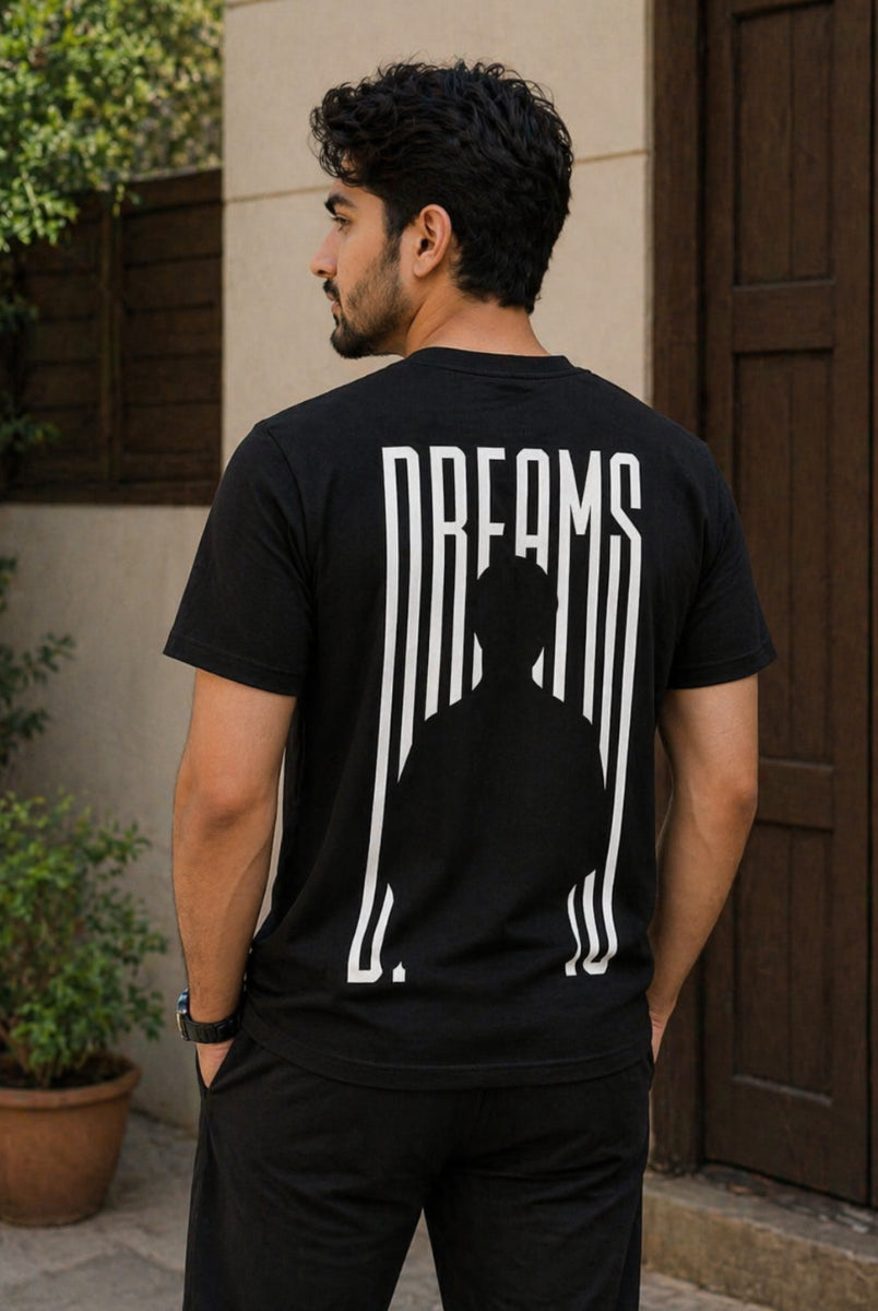 Black Dreams graphic T-shirt front view on hanger with minimalist print