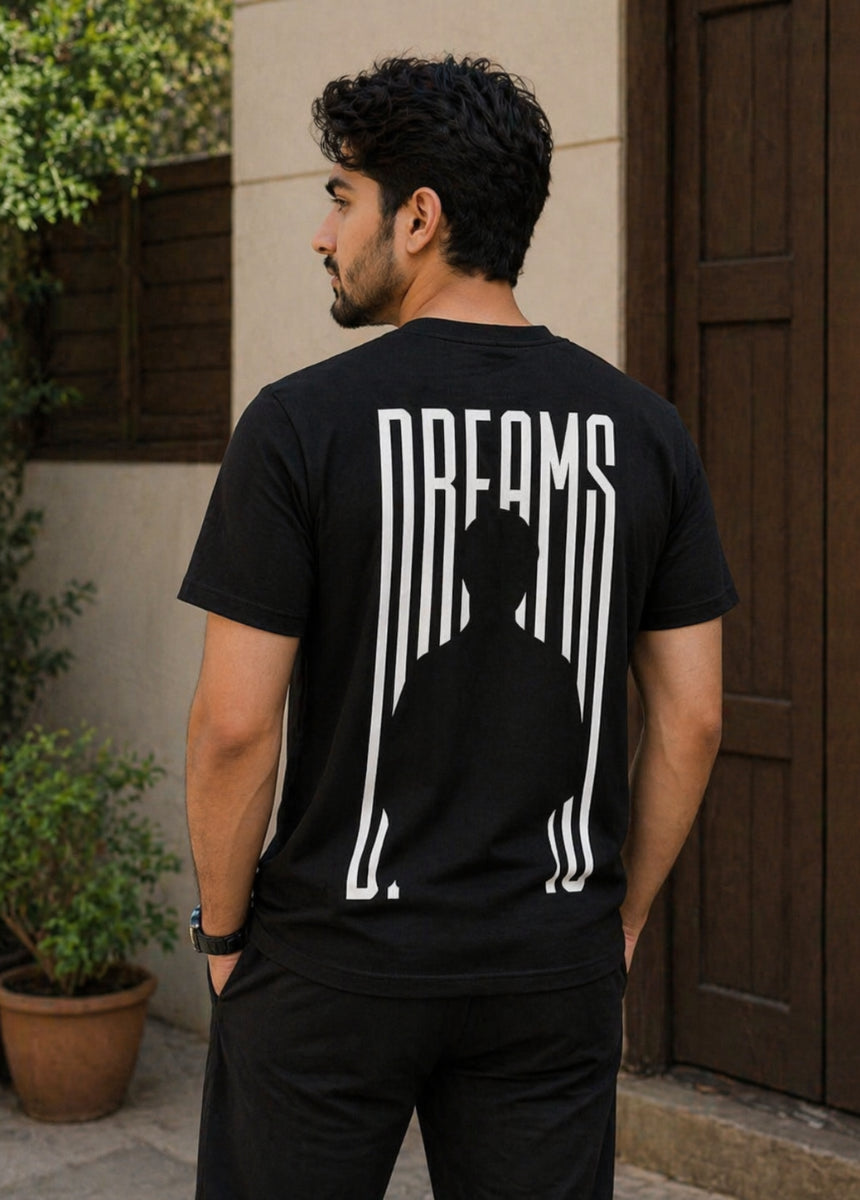 Black Dreams graphic T-shirt front view on hanger with minimalist print
