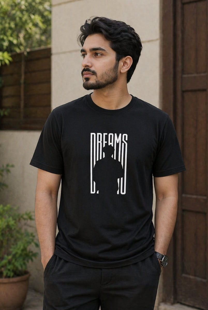 Black Dreams graphic T-shirt front view on hanger with minimalist print