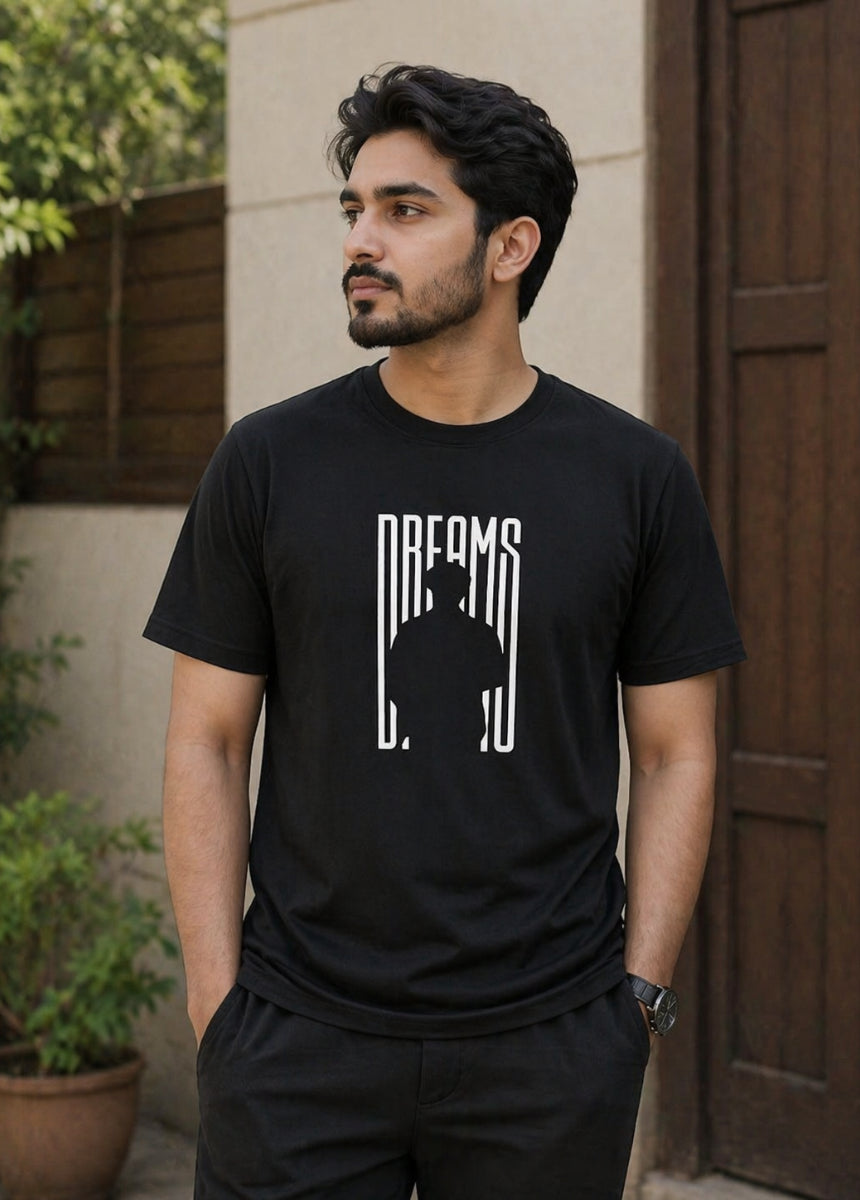 Black Dreams graphic T-shirt front view on hanger with minimalist print