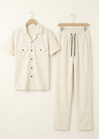 Cream co-ord set for men with short sleeve shirt and matching pants front view