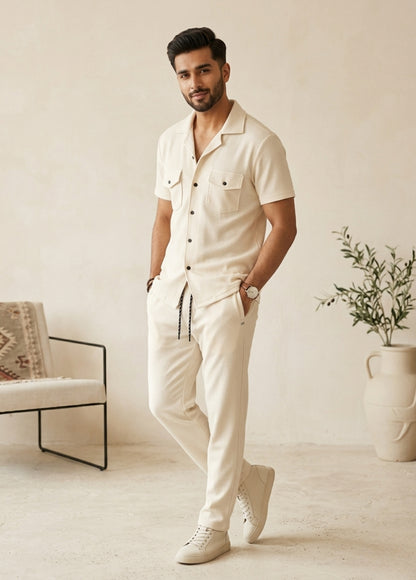 Cream co-ord set for men with short sleeve shirt and matching pants front view
