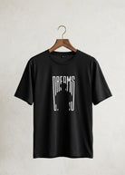 Black Dreams graphic T-shirt front view on hanger with minimalist print