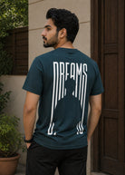 Blue Dreams graphic T-shirt front view hanging on wooden hanger