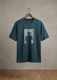 Blue Dreams graphic T-shirt front view hanging on wooden hanger