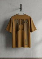 Brown Dreams graphic T-shirt front view hanging on wooden hanger