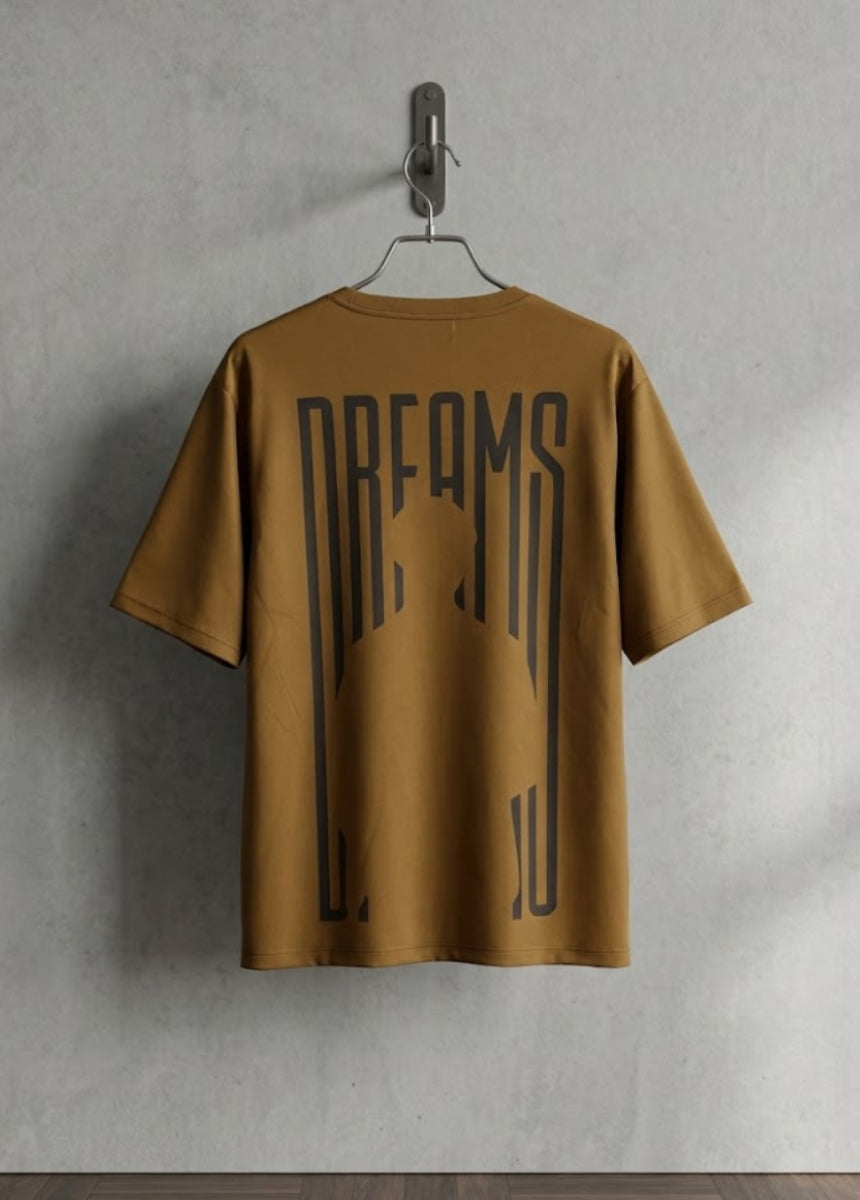 Brown Dreams graphic T-shirt front view hanging on wooden hanger