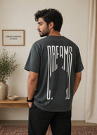 Men’s charcoal grey graphic tee with white Dreams front print