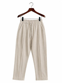 Beige wide-leg cropped pants with an elastic drawstring waist