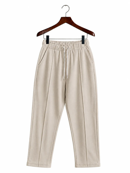 Beige wide-leg cropped pants with an elastic drawstring waist